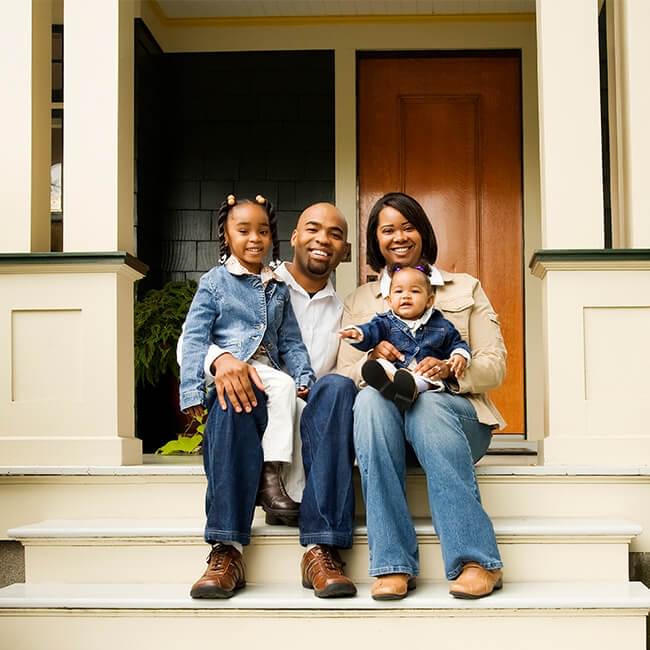 Family sitting on porch