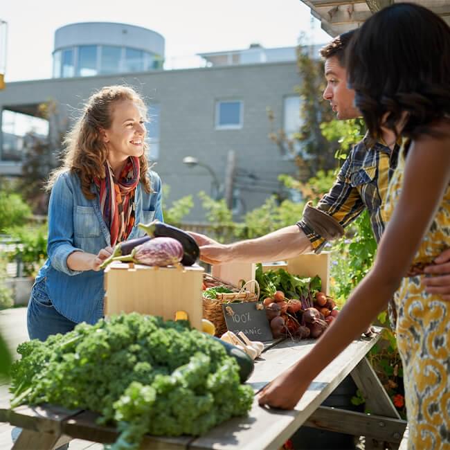 Merchats providing vegetables at market